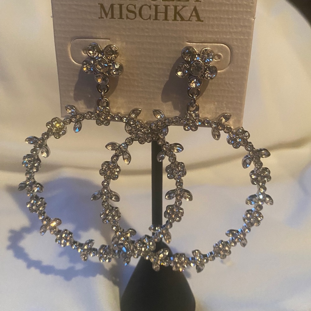 Silver flower hoop earrings